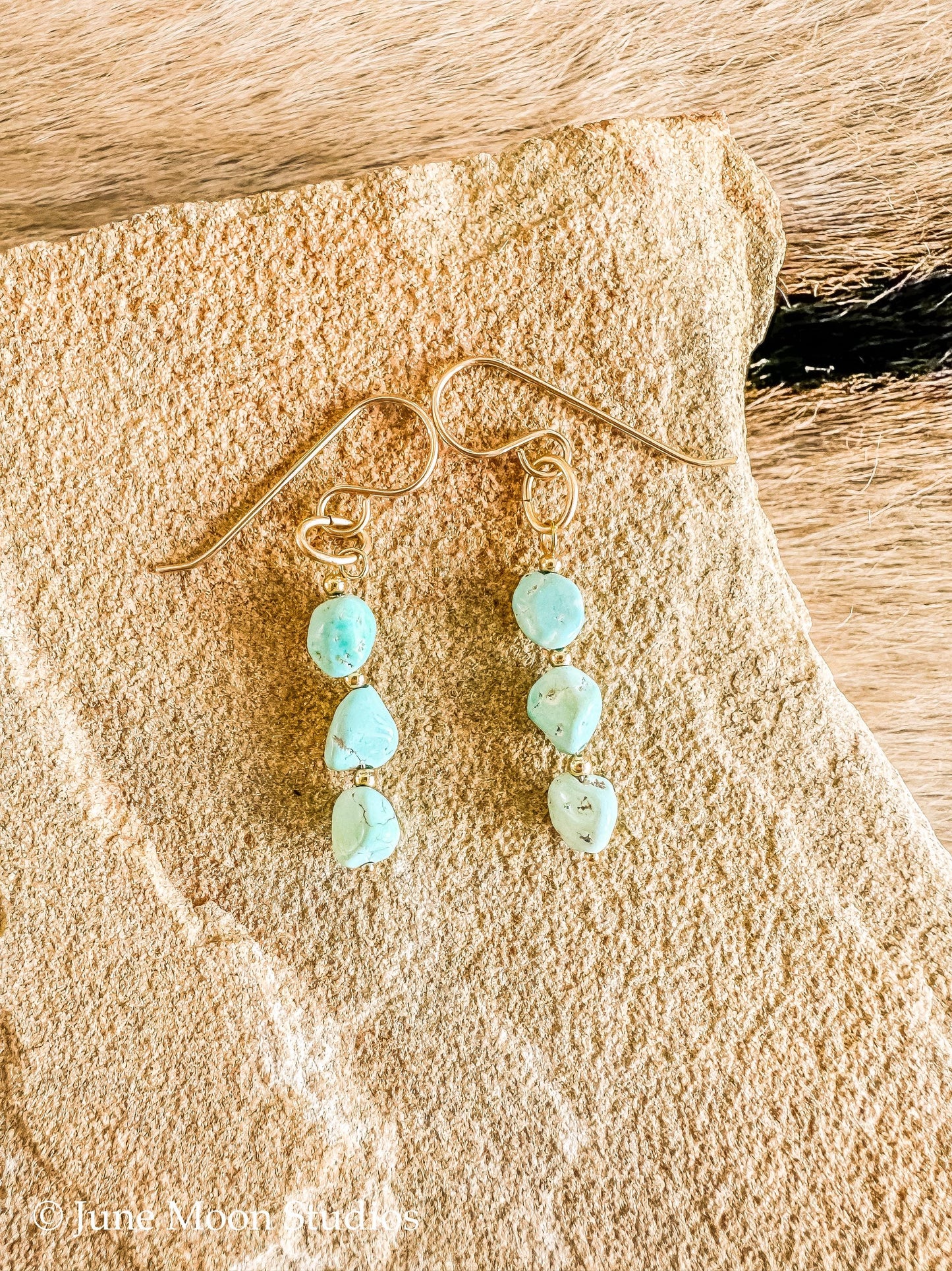 The Tazanna Lone Mountain Turquoise Earrings