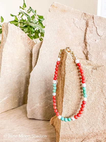 The Kaiyah Apple Coral & Kingman Turquoise Bracelet